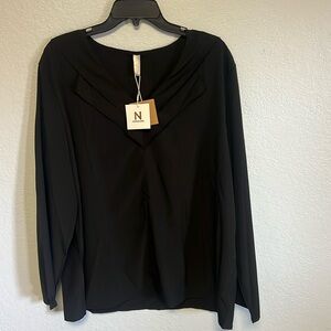 Black long sleeve top.
